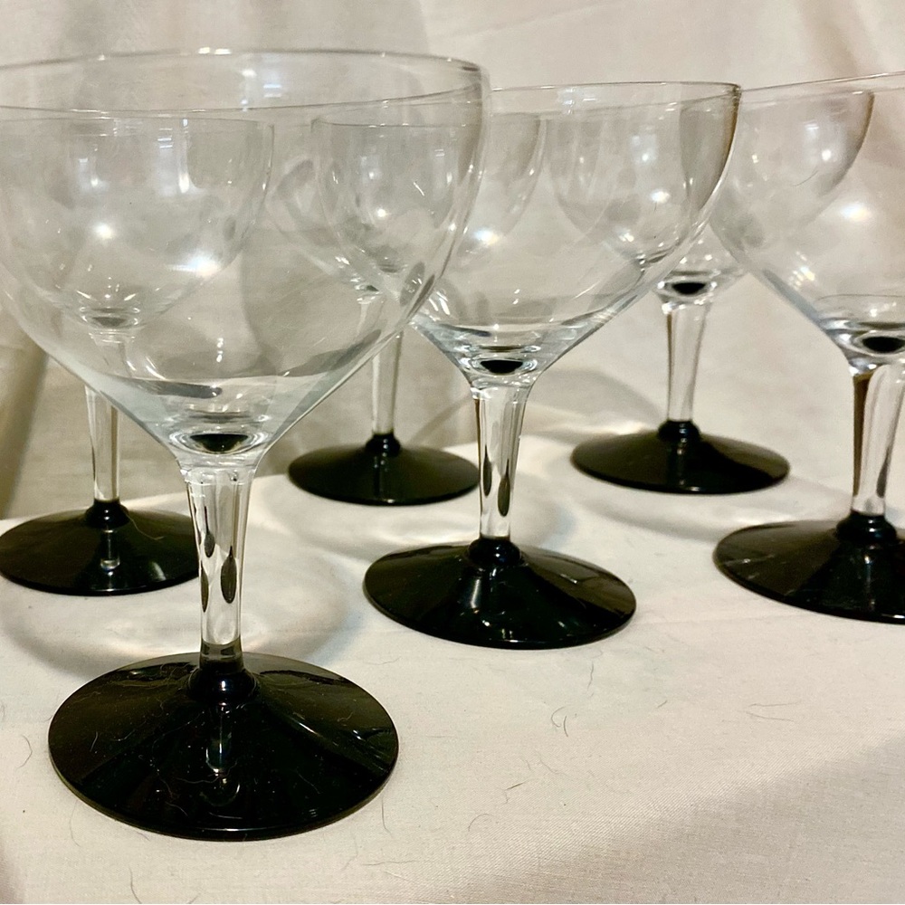 Set of 6 vintage black stem glasses and a decanter.